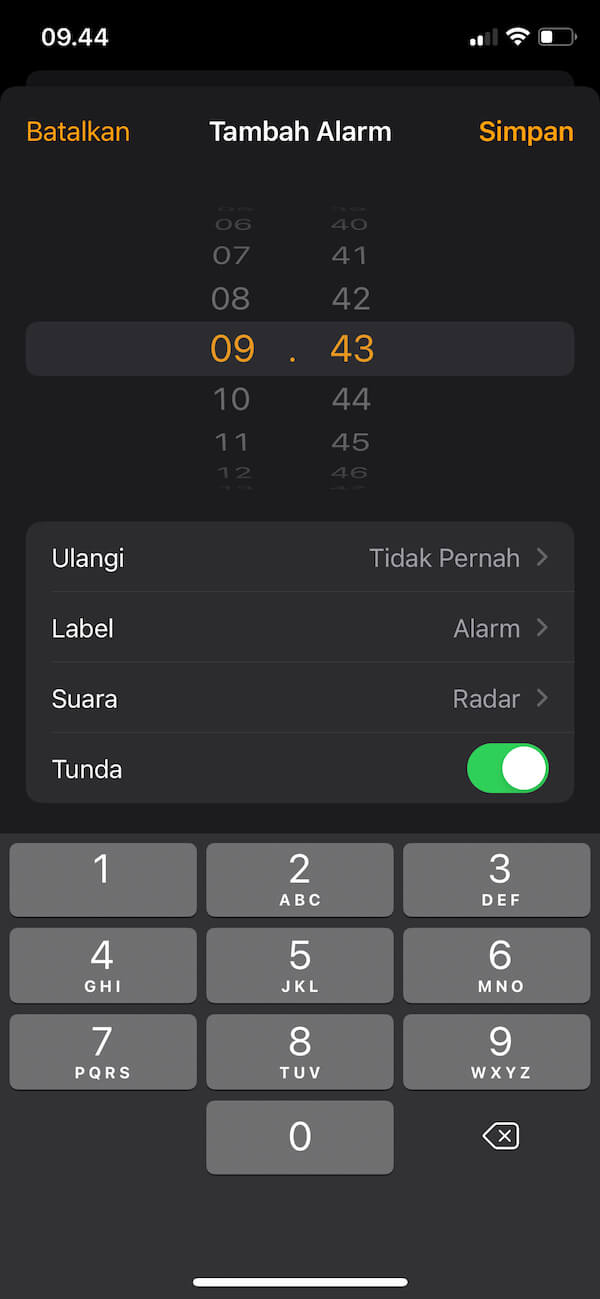 mengatur alarm di iPhone